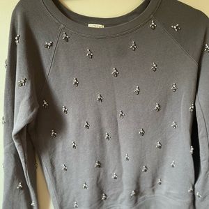 Grey sweater with s-size stones